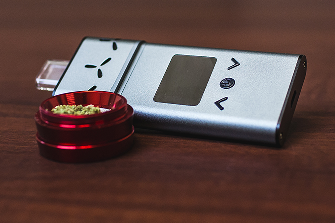 AirVape Xs digital vaporizer and some ground cannabis.